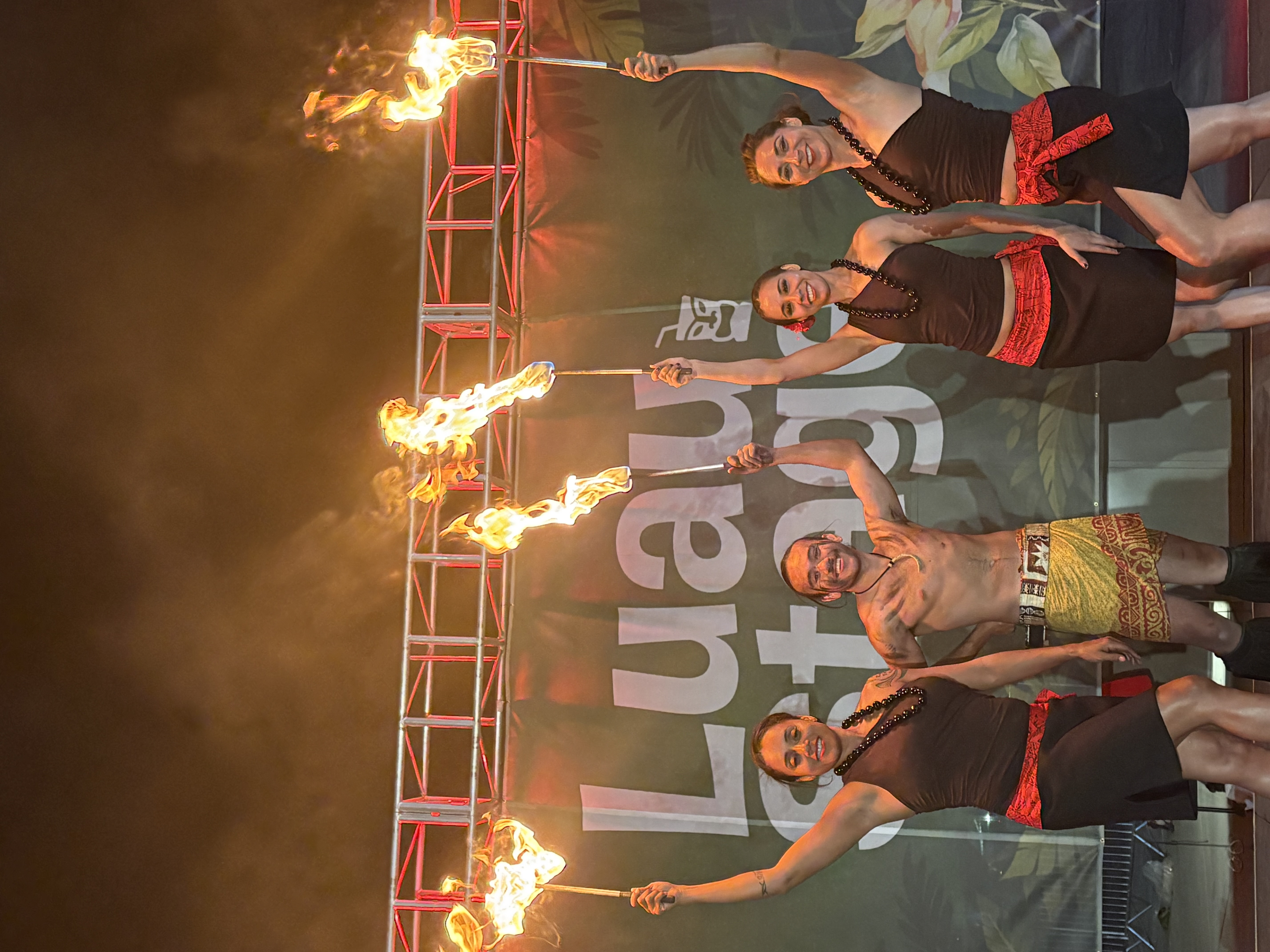 Polynesian fire dance troupe on stage